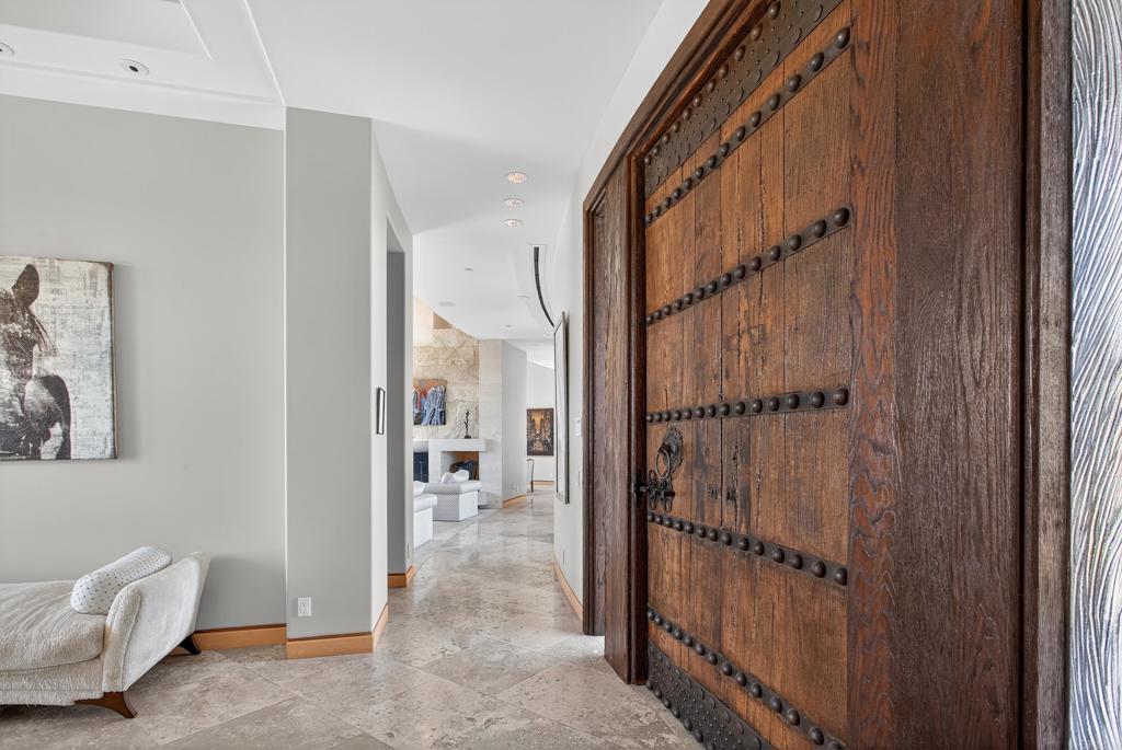 17534 Los Morros Rancho Santa Fe, CA 92067 - Photo 6 of 40 a view of a hallway with a livingroom and entryway