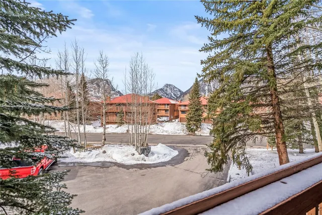a view of a swimming pool with an outdoor seating