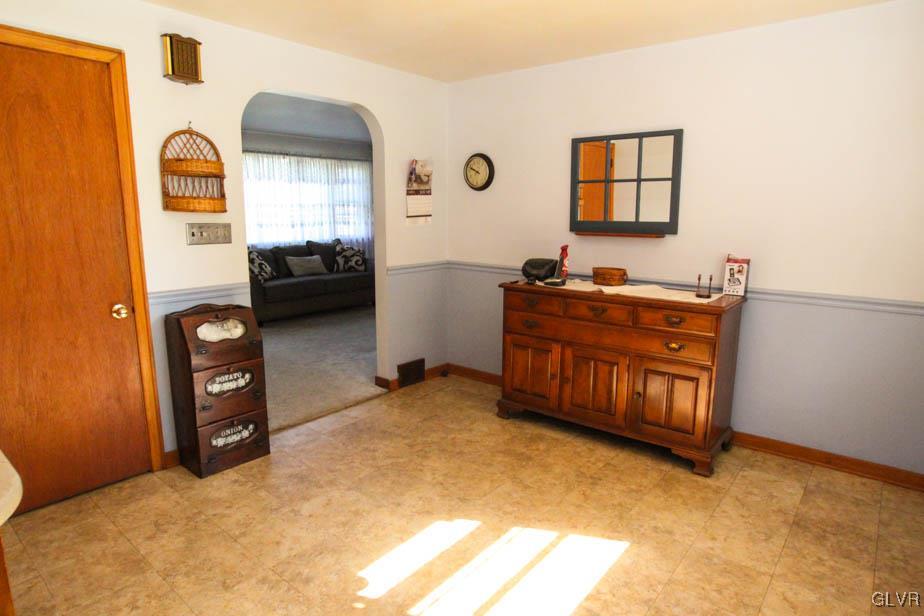 5916 Old Carriage Road Bath, PA 18014 - Photo 15 of 28 a bed room with a bed and a tv