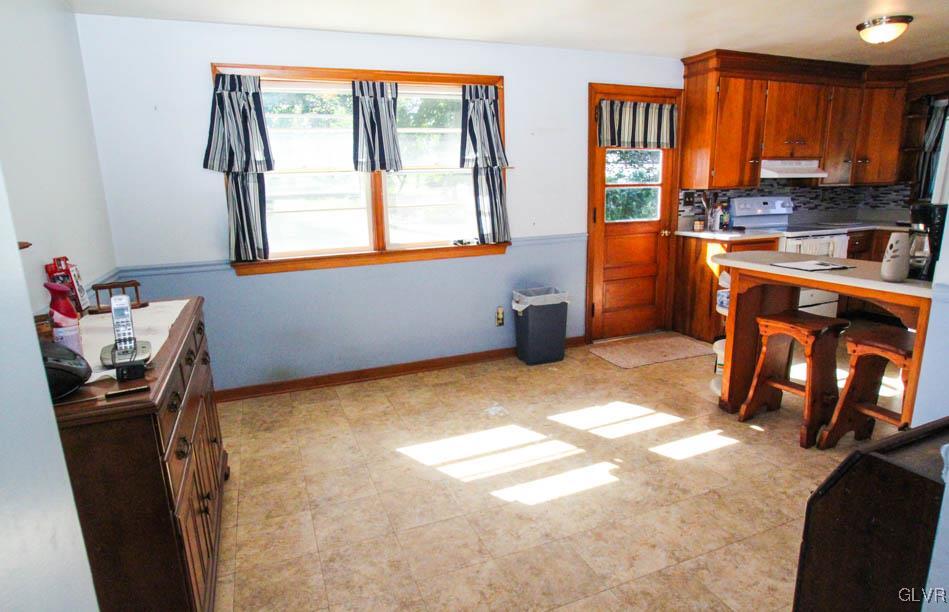 5916 Old Carriage Road Bath, PA 18014 - Photo 5 of 28 a view of room with window and refrigerator