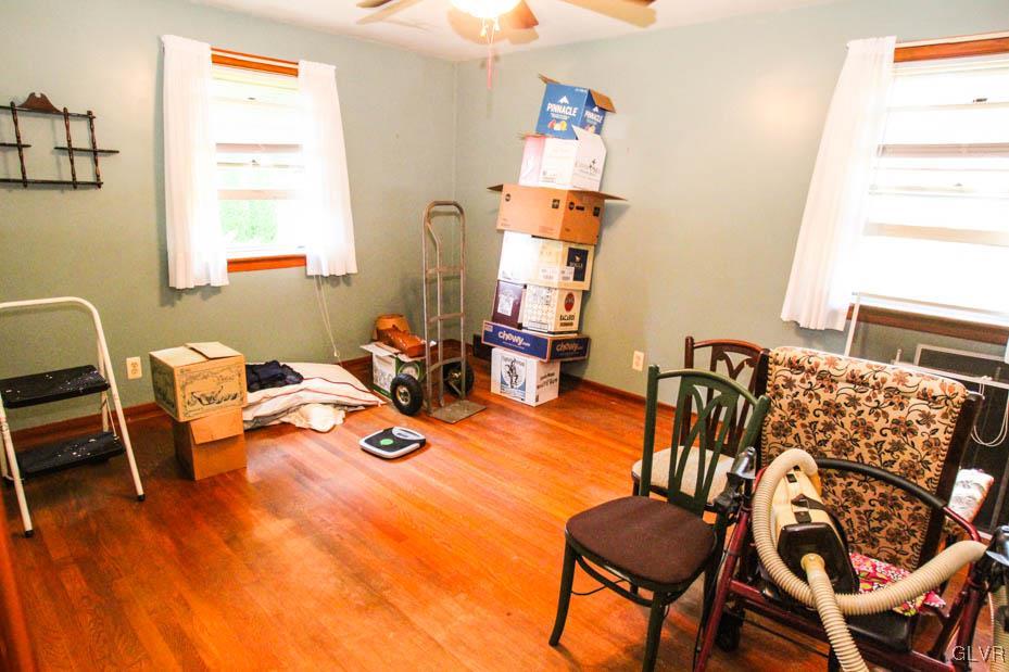 5916 Old Carriage Road Bath, PA 18014 - Photo 10 of 28 a dining room with furniture and wooden floor