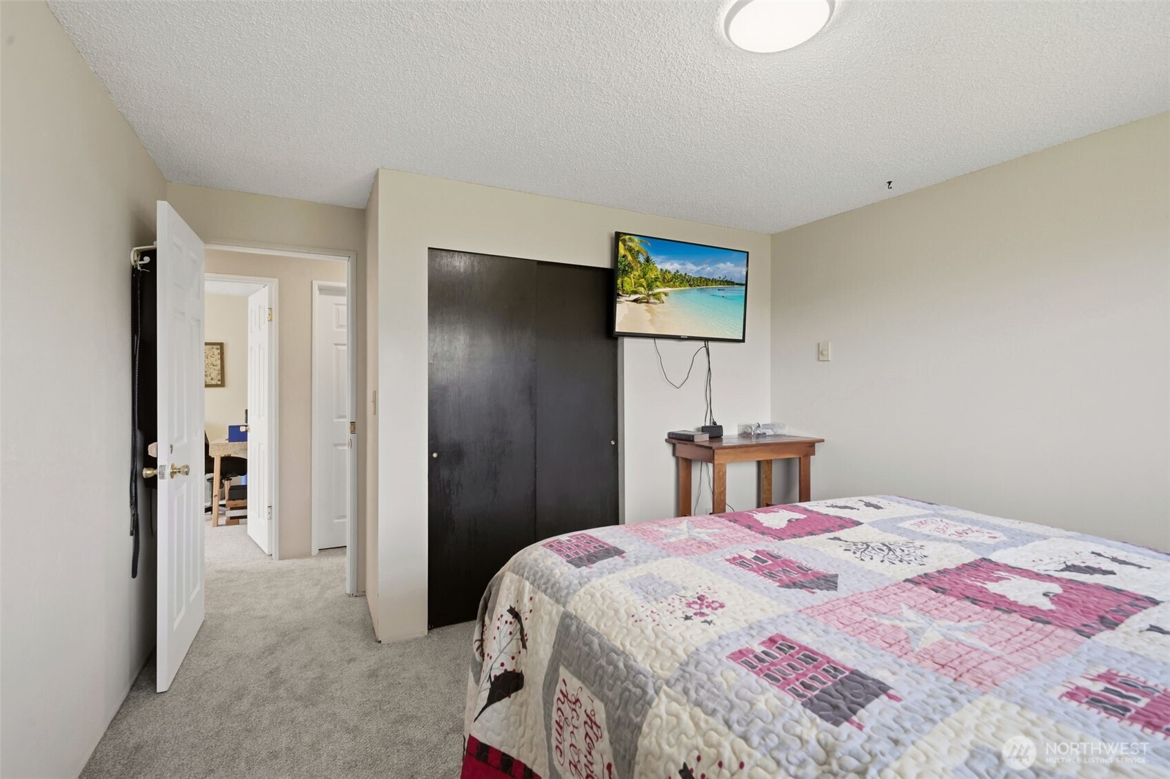 209 West Scott Street Aberdeen, WA 98520 - Photo 13 of 26 a bedroom with a bed and a table