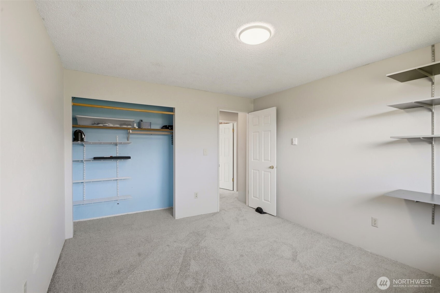 209 West Scott Street Aberdeen, WA 98520 - Photo 15 of 26 a view of an empty room and closet area