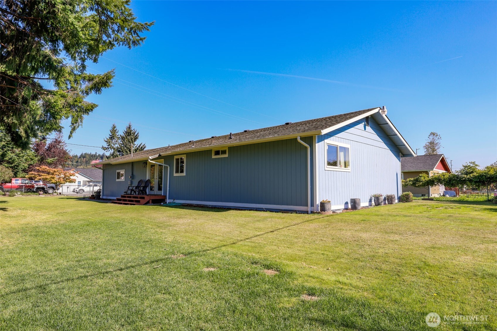 209 West Scott Street Aberdeen, WA 98520 - Photo 16 of 16 a view of a house with backyard and garden