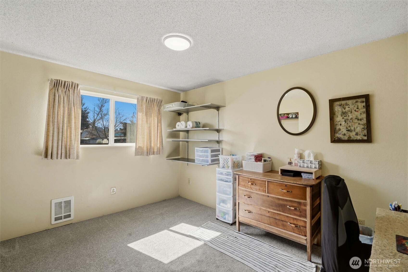 209 West Scott Street Aberdeen, WA 98520 - Photo 16 of 26 a view of a workspace with furniture and window