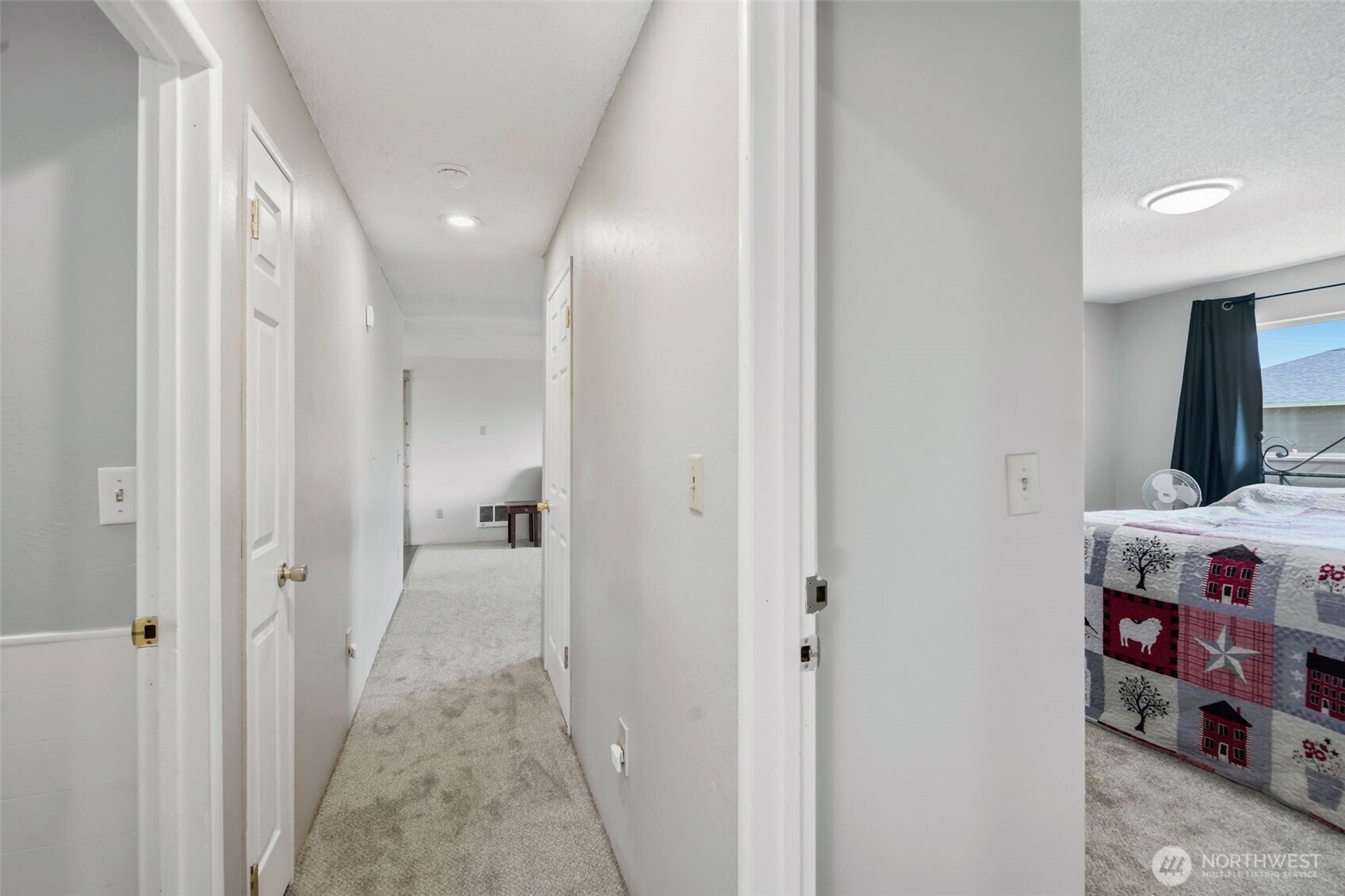 209 West Scott Street Aberdeen, WA 98520 - Photo 20 of 26 a view of a bedroom with a wardrobe space