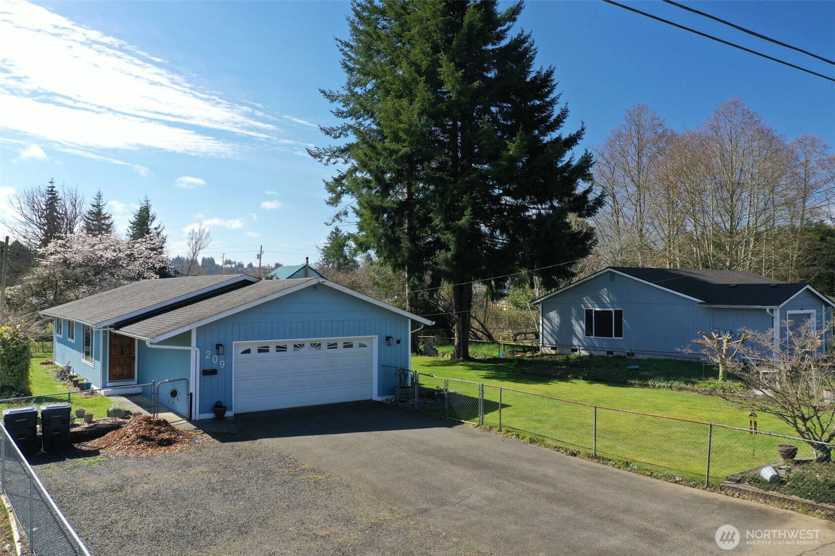 209 West Scott Street Aberdeen, WA 98520 - Photo 2 of 26 a view of house with outdoor space and parking