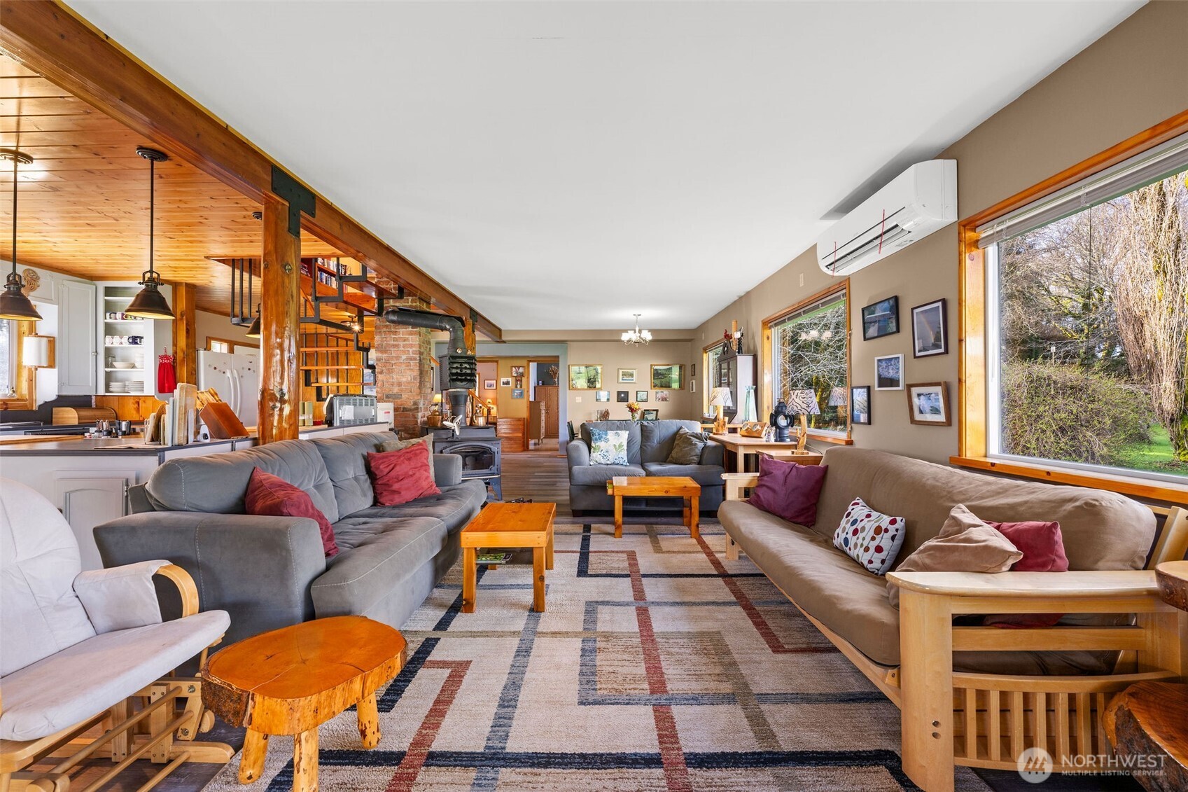 471 Barr Road Grays River, WA 98643 - Photo 20 of 40 a living room with furniture and a large window