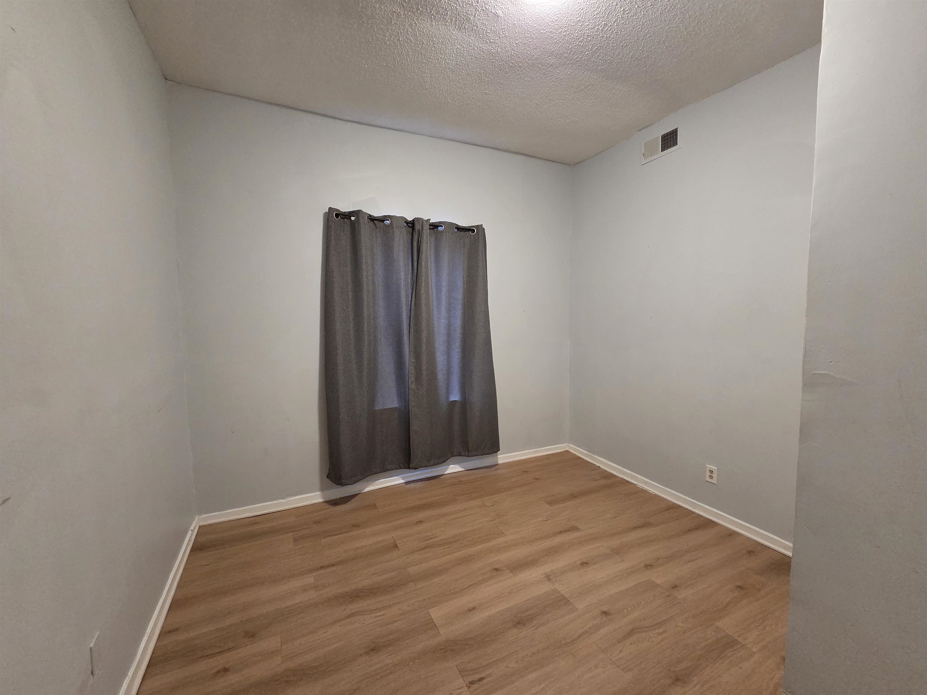 993 Oakview Street, Unit 101 Memphis, TN 38114 - Photo 2 of 14 a view of wooden floor