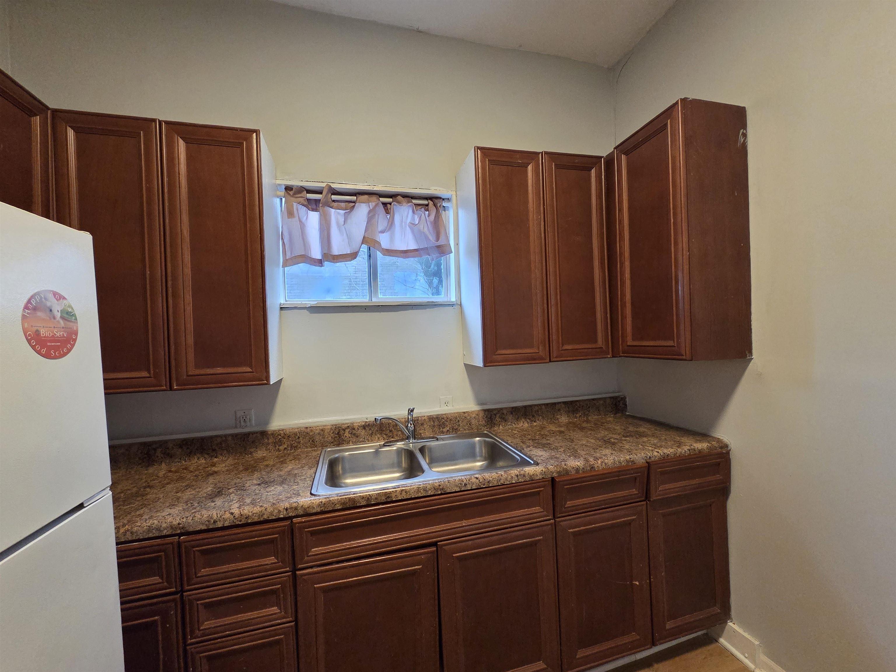 993 Oakview Street, Unit 101 Memphis, TN 38114 - Photo 10 of 14 a kitchen with a sink and cabinets