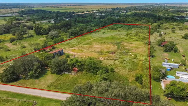 a view of a lake with a yard