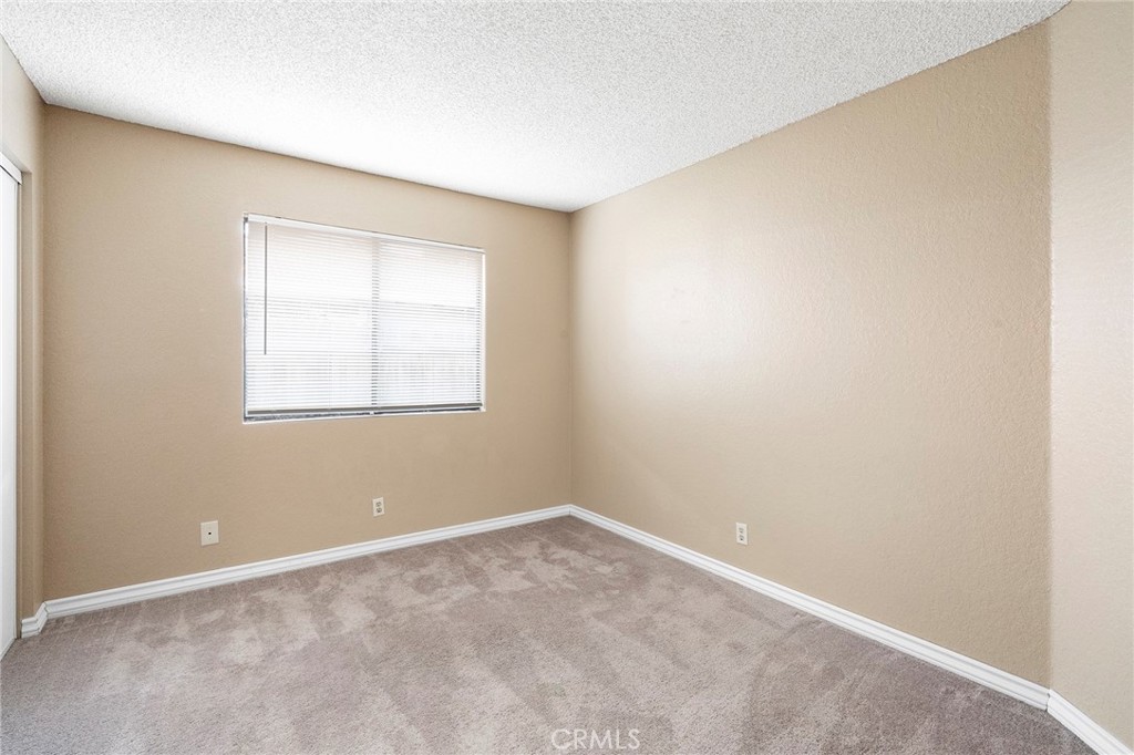 3665 Anchorage Street Hemet, CA 92545 - Photo 17 of 23 an empty room with a window