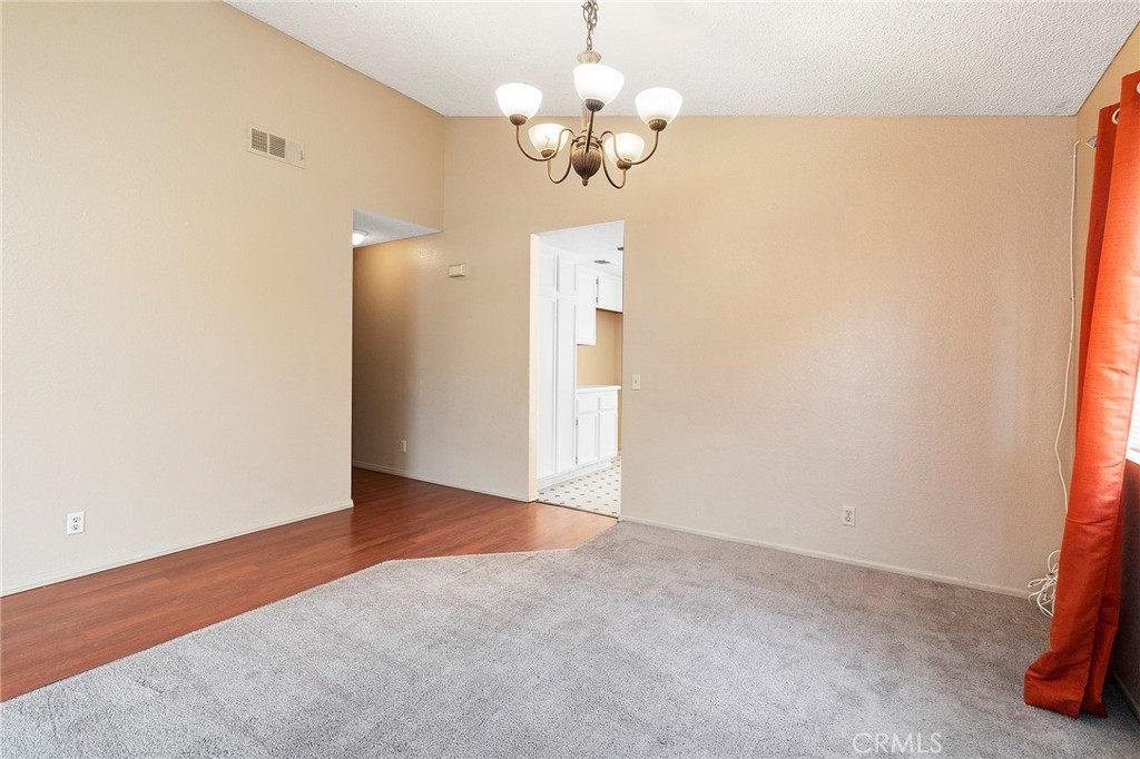 3665 Anchorage Street Hemet, CA 92545 - Photo 6 of 23 a view of a chandelier in a room