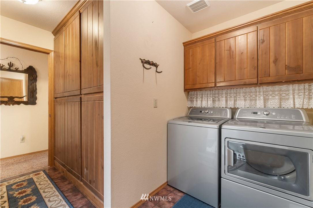 19334 Tall Firs Lane Southwest Rochester, WA 98579 - Photo 29 of 40 a view of washer and dryer