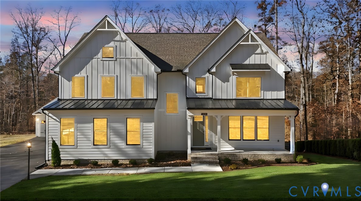 a front view of house with a yard