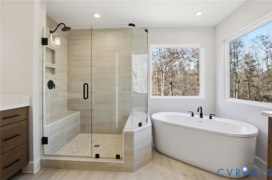 12420 Coalboro Road Chesterfield, VA 23838 - Photo 12 of 19 a bathroom with a bathtub and a shower