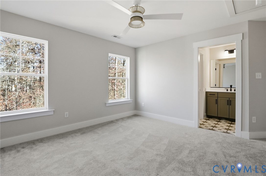 12420 Coalboro Road Chesterfield, VA 23838 - Photo 14 of 19 an empty room with windows and closet