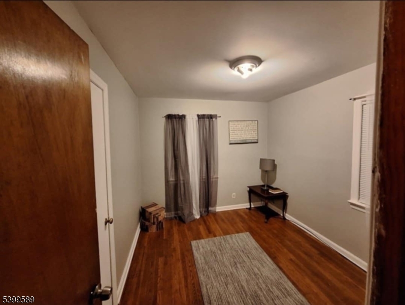 502 Drake Avenue Roselle, NJ 07203 - Photo 12 of 21 a view of a room with wooden floor