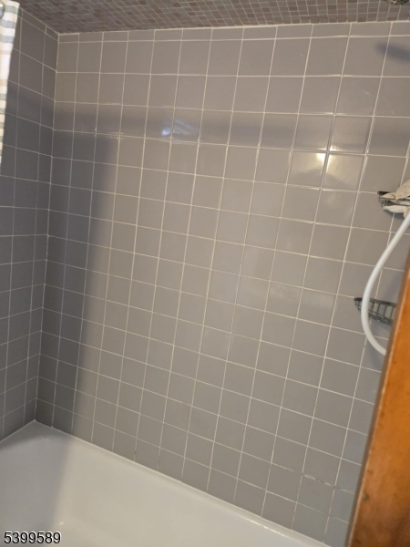 502 Drake Avenue Roselle, NJ 07203 - Photo 14 of 21 a bathroom with a bathtub