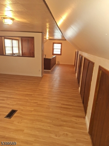 502 Drake Avenue Roselle, NJ 07203 - Photo 15 of 21 a view of a room with wooden floor and staircase