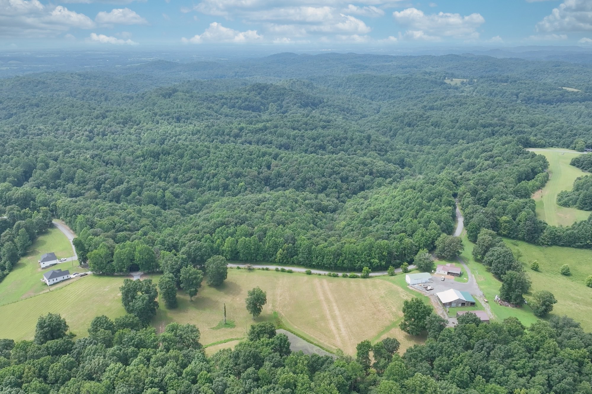0 Hog Back Ridge Road Bethpage, TN 37022 - Photo 9 of 39 an aerial view of residential house with outdoor space
