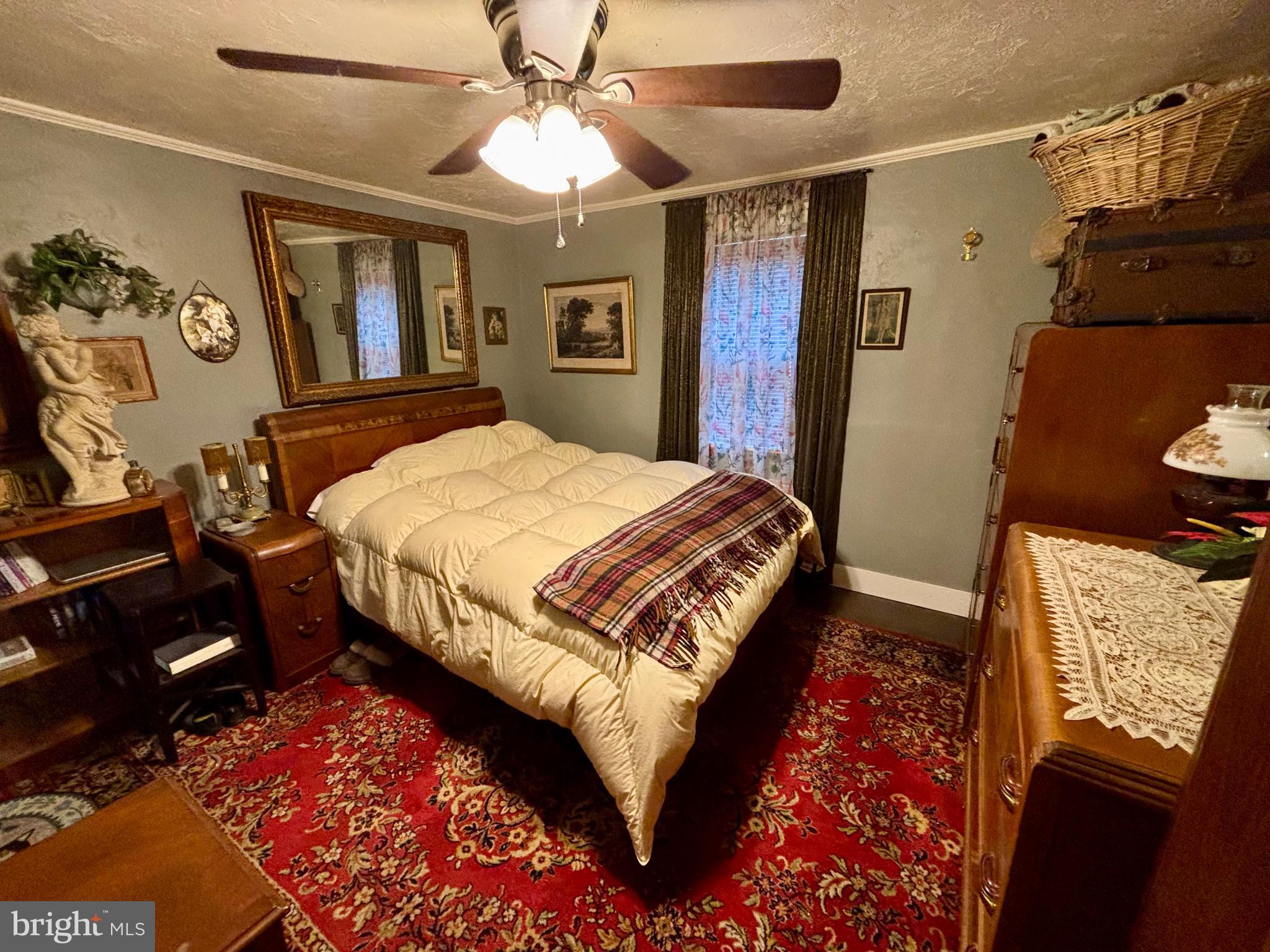 3485 Pine Grove Road Stanley, VA 22851 - Photo 20 of 47 a bed sitting in a bedroom next to a window