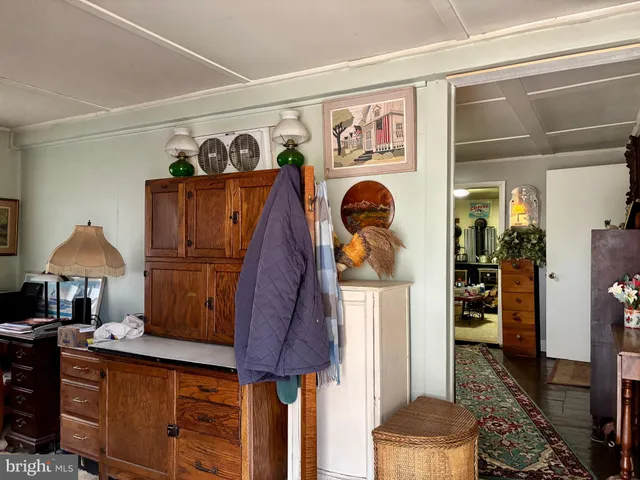 a view of a entryway with furniture and toys