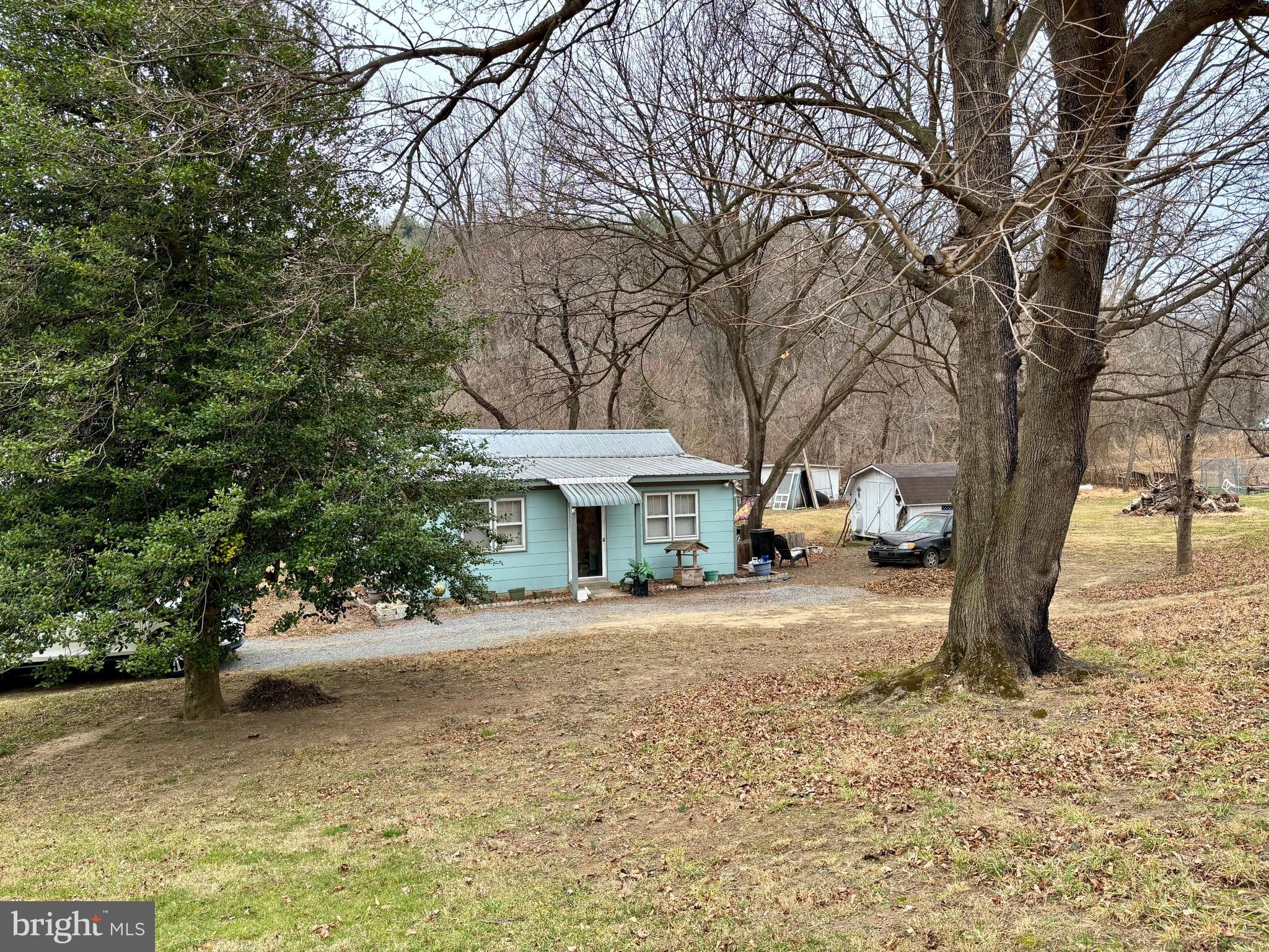 3485 Pine Grove Road Stanley, VA 22851 - Photo 28 of 47 a view of a house with a yard covered in snow