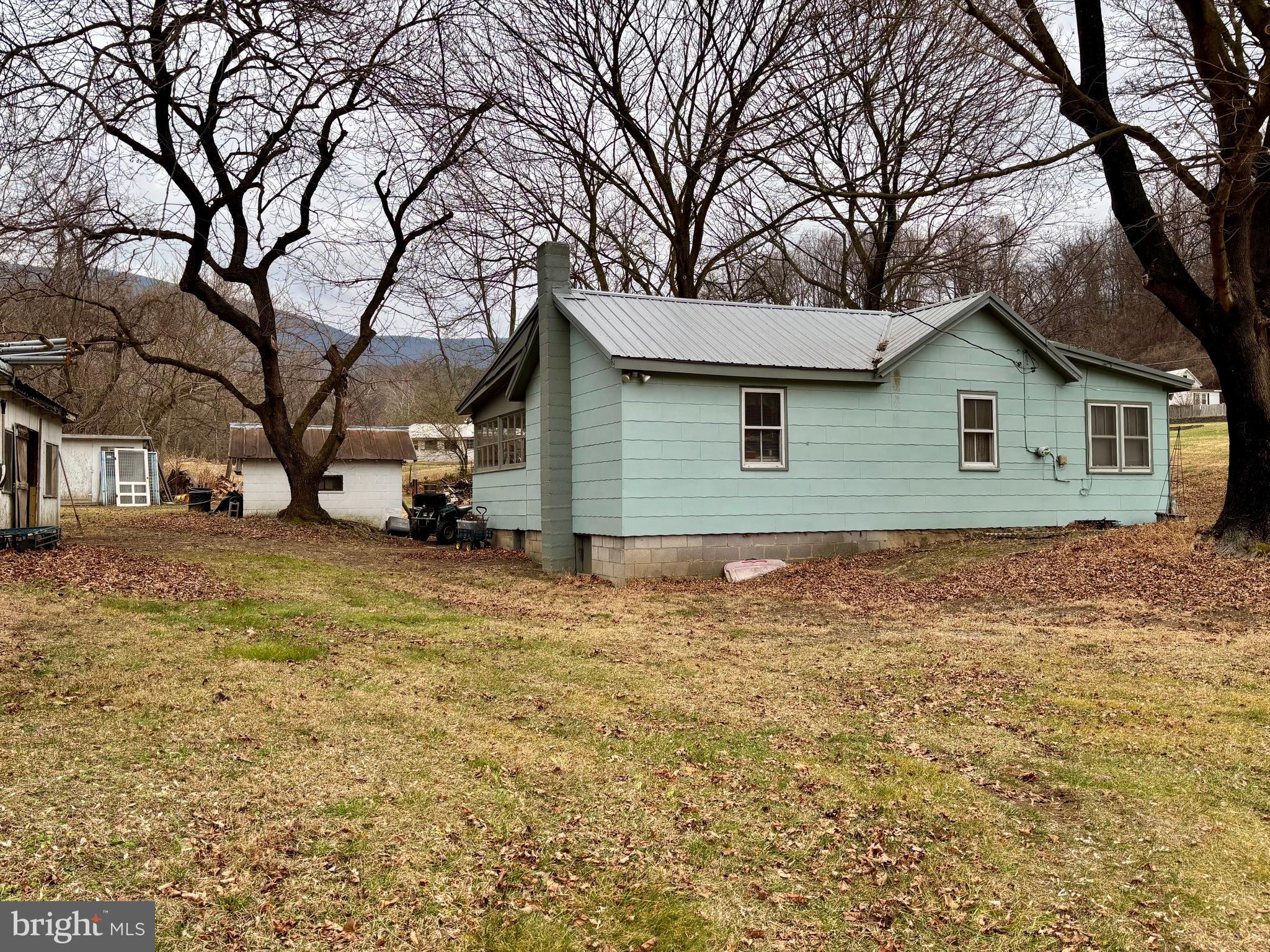 3485 Pine Grove Road Stanley, VA 22851 - Photo 30 of 47 a view of a house with a yard and garage