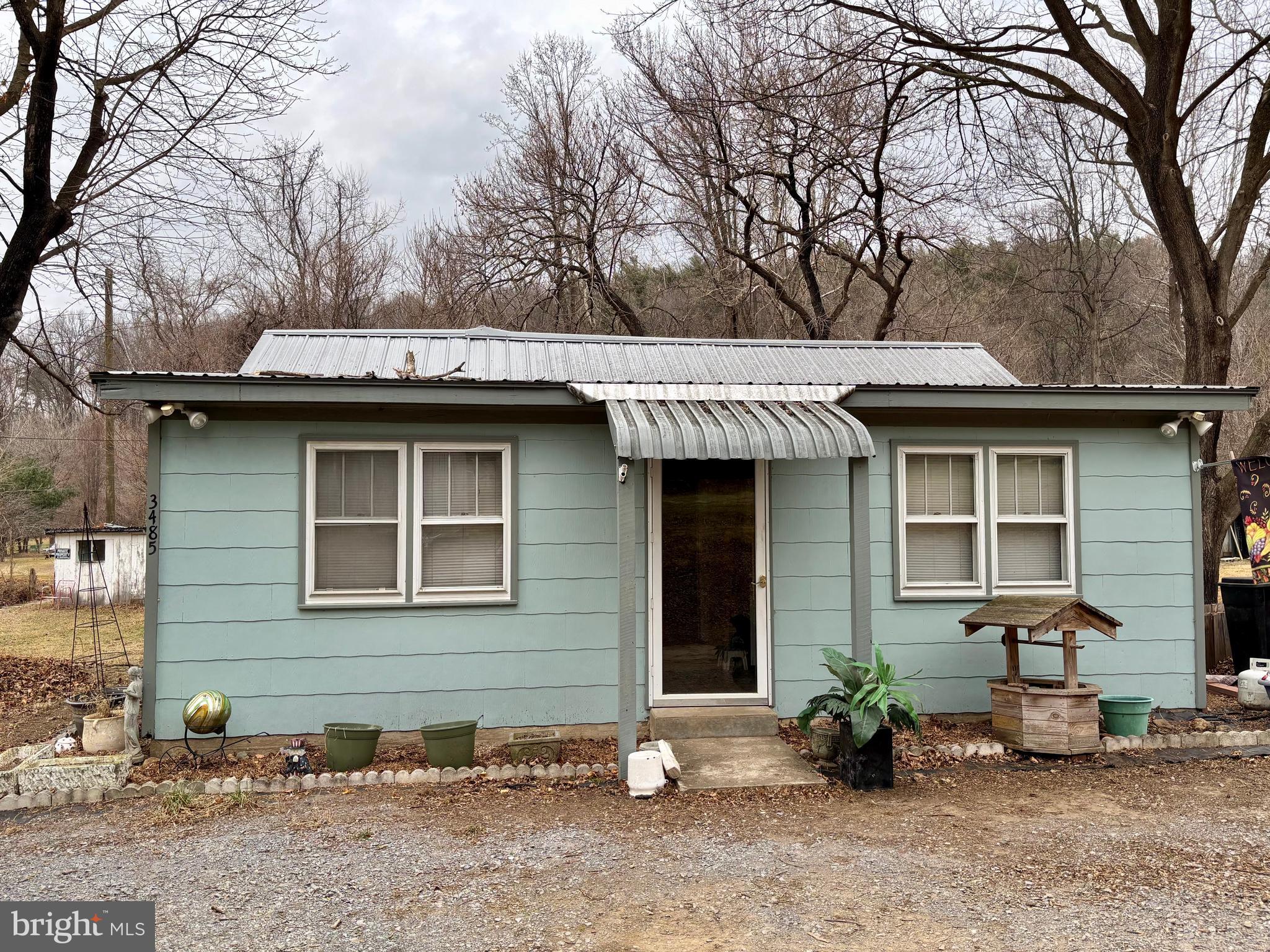 3485 Pine Grove Road Stanley, VA 22851 - Photo 31 of 47 a view of a house with a yard and sitting area