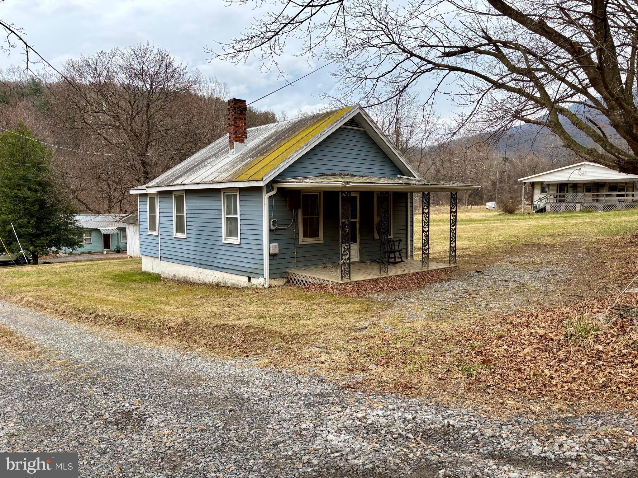 3485 Pine Grove Road Stanley, VA 22851 - Photo 35 of 47 a front view of a house with a yard
