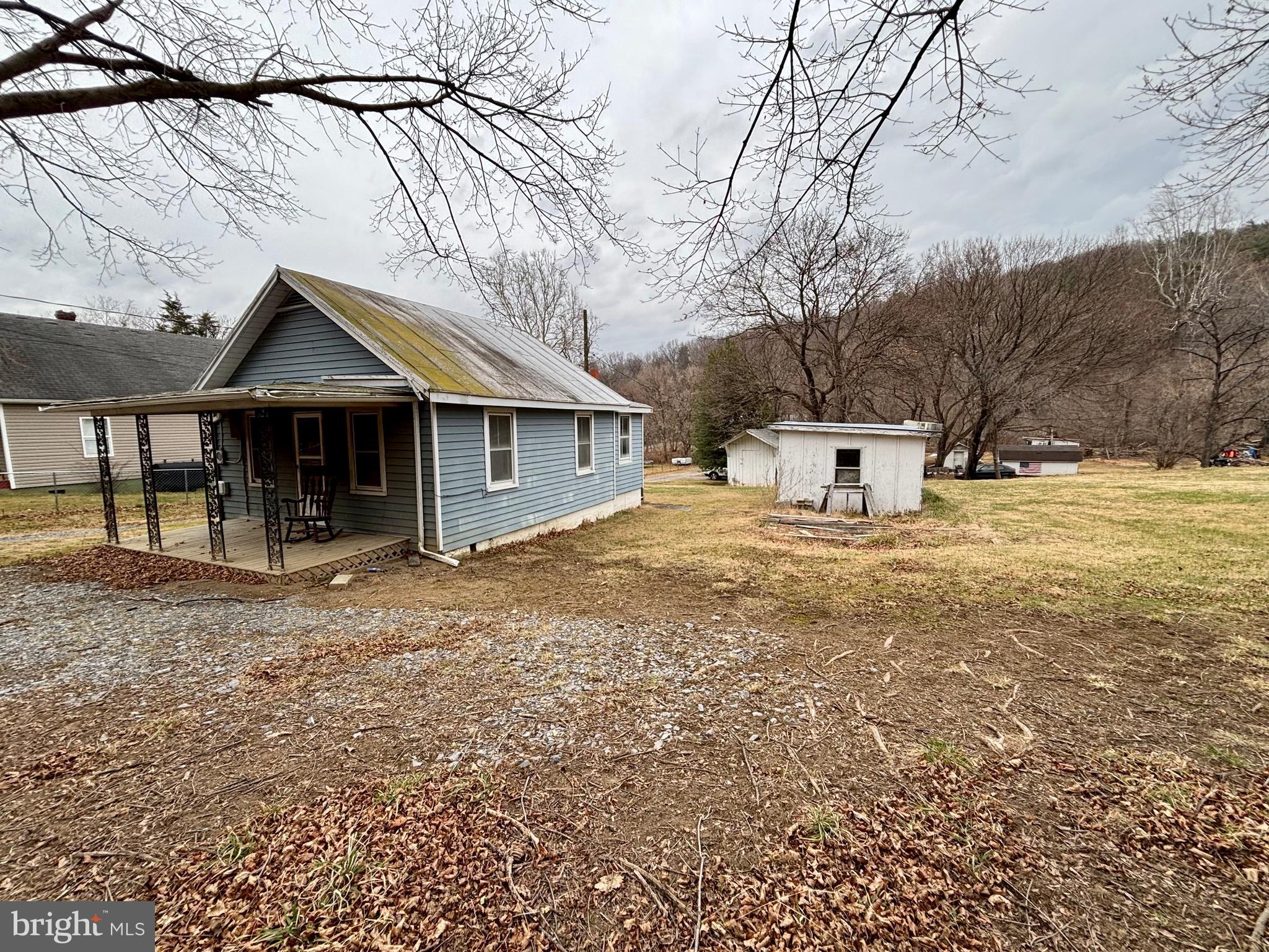 3485 Pine Grove Road Stanley, VA 22851 - Photo 37 of 47 a front view of a house with a yard and garage