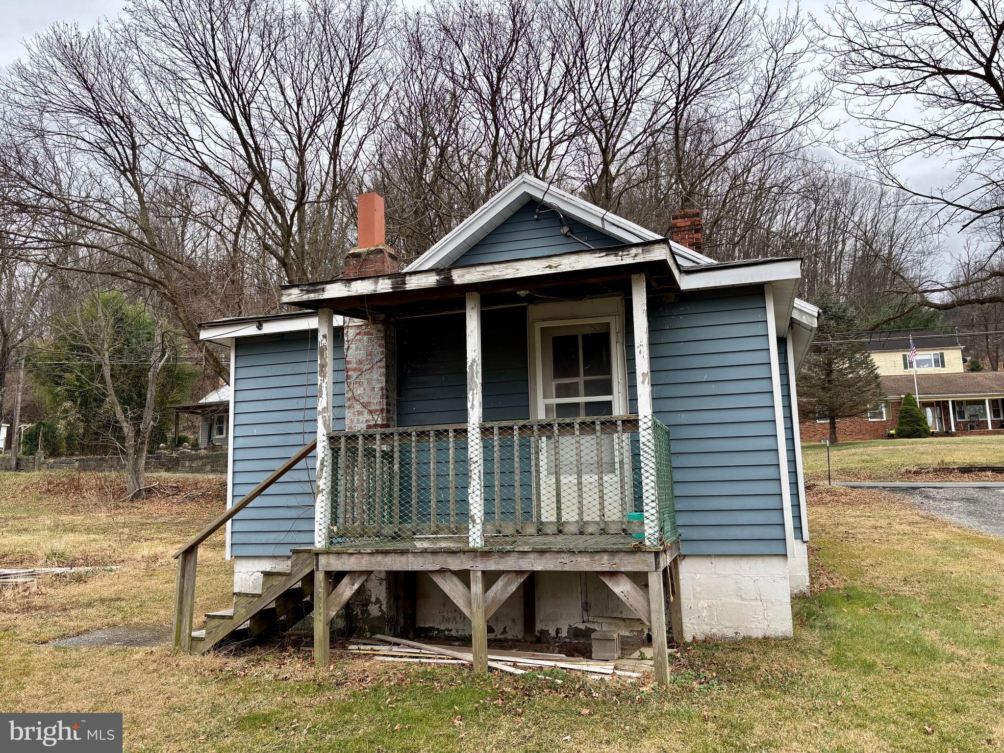 3485 Pine Grove Road Stanley, VA 22851 - Photo 39 of 47 a small white house with a white roof and wooden fence