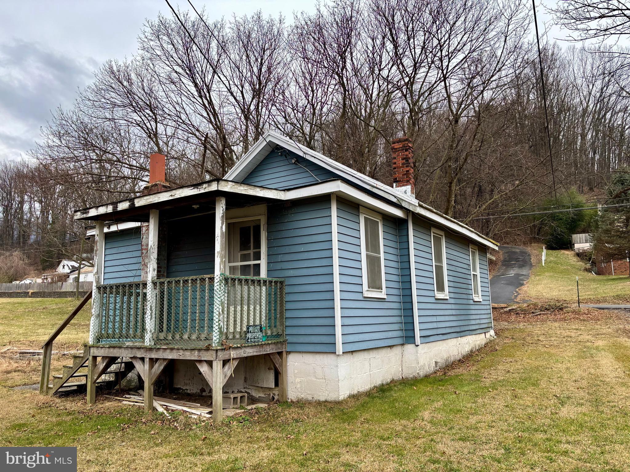 3485 Pine Grove Road Stanley, VA 22851 - Photo 40 of 47 a backyard of a house with yard outdoor seating and barbeque oven
