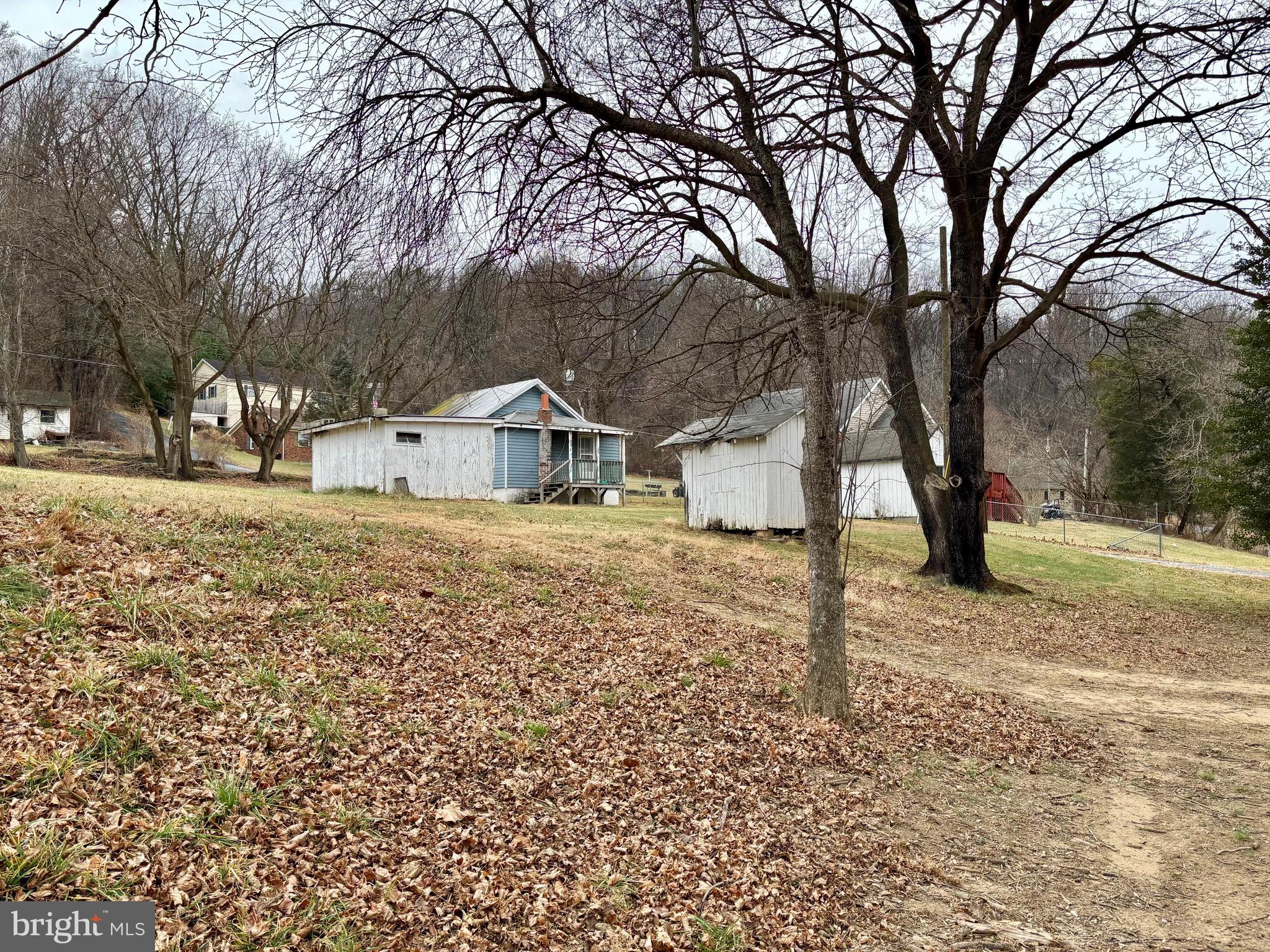 3485 Pine Grove Road Stanley, VA 22851 - Photo 47 of 47 a house with trees in front of it