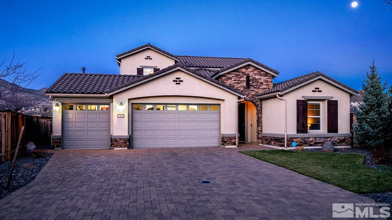 1640 Elk Run Trail Reno, NV 89523 - Photo 2 of 40 a front view of a house with garden