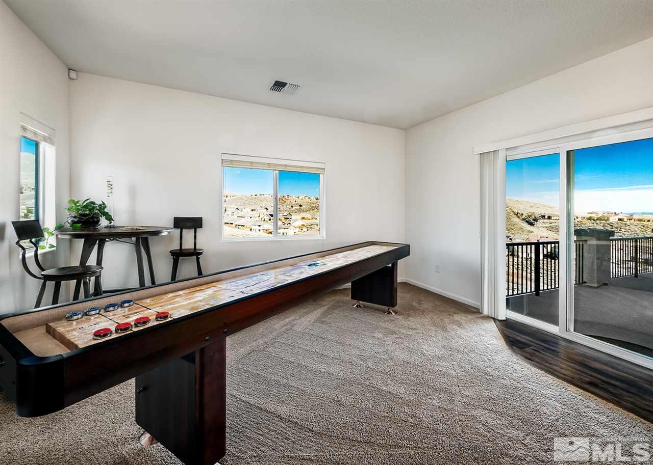 1640 Elk Run Trail Reno, NV 89523 - Photo 28 of 40 a room with furniture pool table and flat screen tv