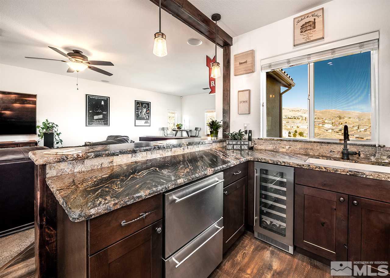 1640 Elk Run Trail Reno, NV 89523 - Photo 29 of 40 a kitchen with a sink and a stove