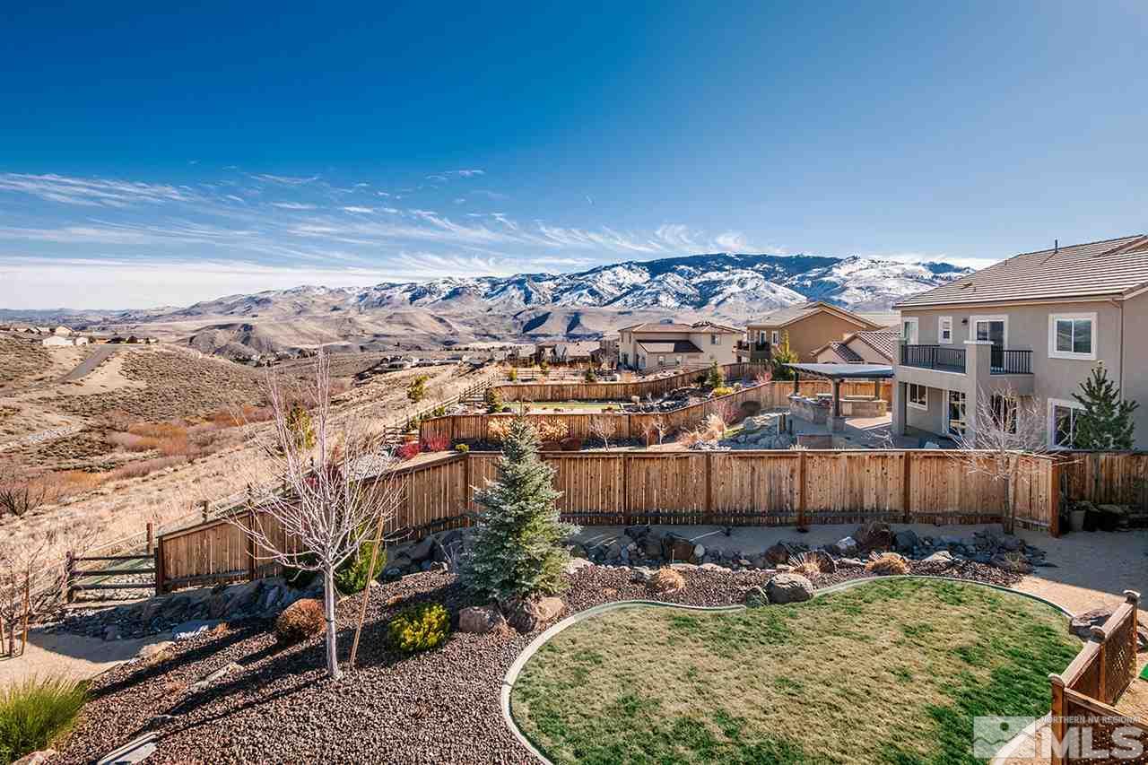 1640 Elk Run Trail Reno, NV 89523 - Photo 35 of 40 a view of a chairs and table in the backyard
