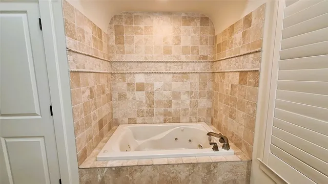 a bathroom with a bathtub