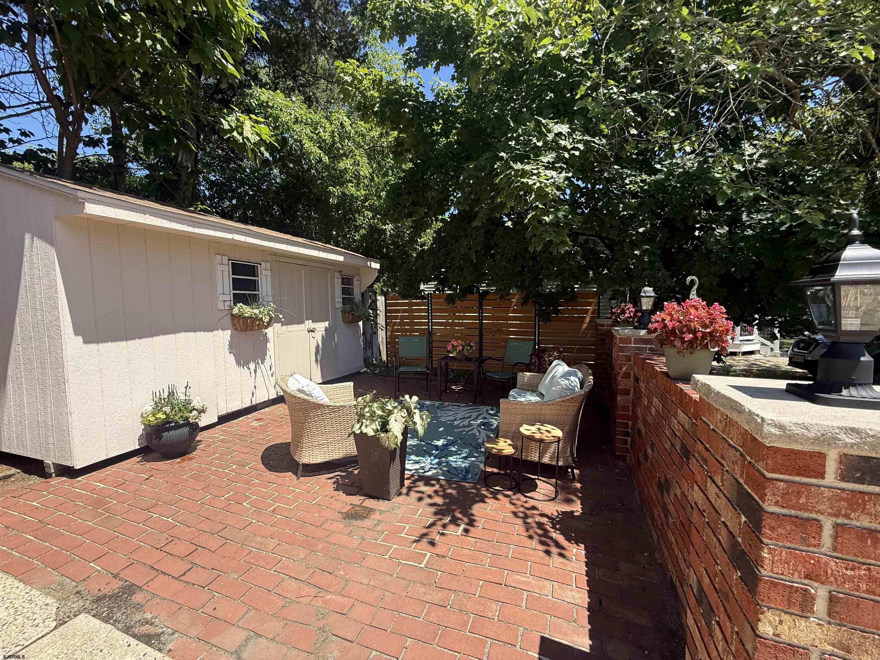 194 North Shore Road Absecon, NJ 08201 - Photo 33 of 44 a front view of a house with patio