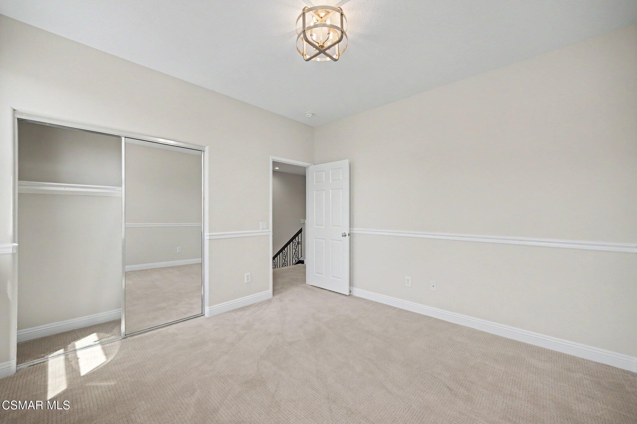 20800 Sardinia Way Porter Ranch, CA 91326 - Photo 37 of 57 a view of an empty room with a window