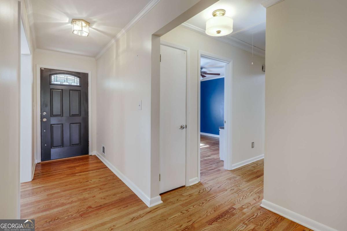 206 Fortson Drive Athens, GA 30606 - Photo 22 of 38 a view of a hallway with wooden floor