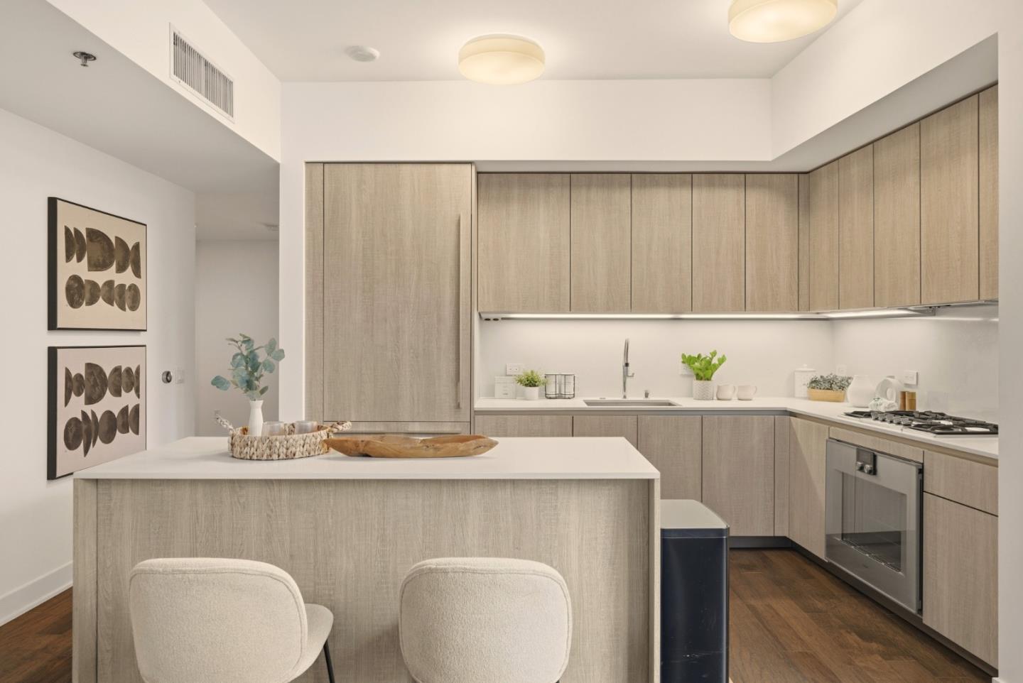 318 Main Street, Unit 6B San Francisco, CA 94105 - Photo 13 of 40 a kitchen with a sink cabinets and window