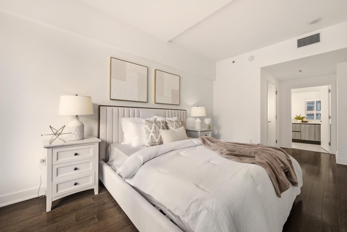 318 Main Street, Unit 6B San Francisco, CA 94105 - Photo 20 of 40 a bedroom with a bed and a night stand