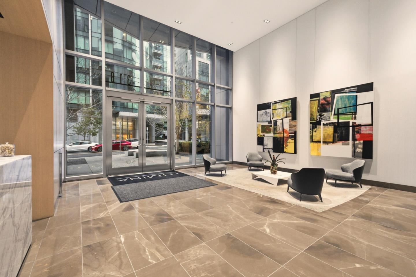 318 Main Street, Unit 6B San Francisco, CA 94105 - Photo 39 of 40 a living room with furniture a rug and white walls