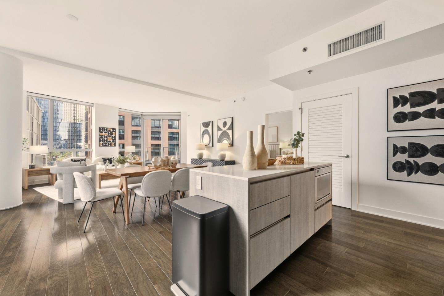 318 Main Street, Unit 6B San Francisco, CA 94105 - Photo 8 of 40 a living room with furniture and wooden floor