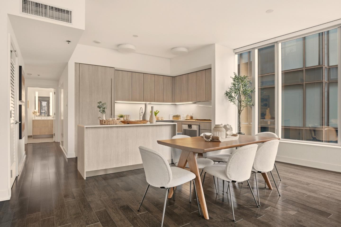 318 Main Street, Unit 6B San Francisco, CA 94105 - Photo 10 of 40 a dining room with furniture and wooden floor