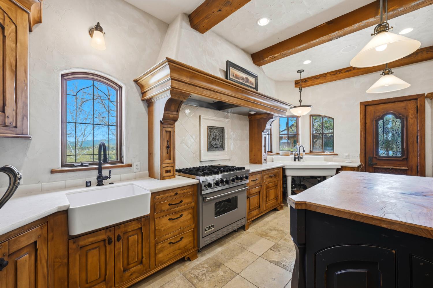2581 Shirland Tract Road Auburn, CA 95603 - Photo 17 of 61 a kitchen with stainless steel appliances granite countertop a stove and a sink
