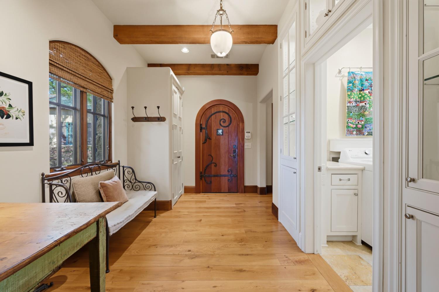 2581 Shirland Tract Road Auburn, CA 95603 - Photo 22 of 61 a living room with furniture and a chandelier